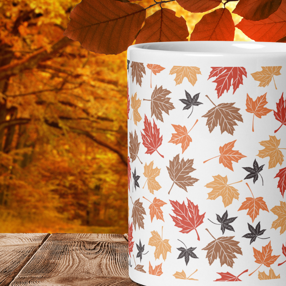 Herbst Tasse „Laubzauber“ – Keramikbecher mit buntem Blättermuster