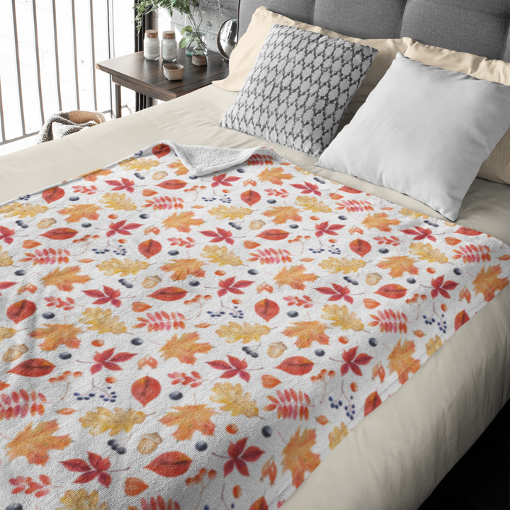 Herbst Hygge Kuscheldecke „Autumn Harmony“ – Decke mit buntem Blättermuster